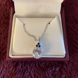 Helzberg pendant necklace, dark blue stones